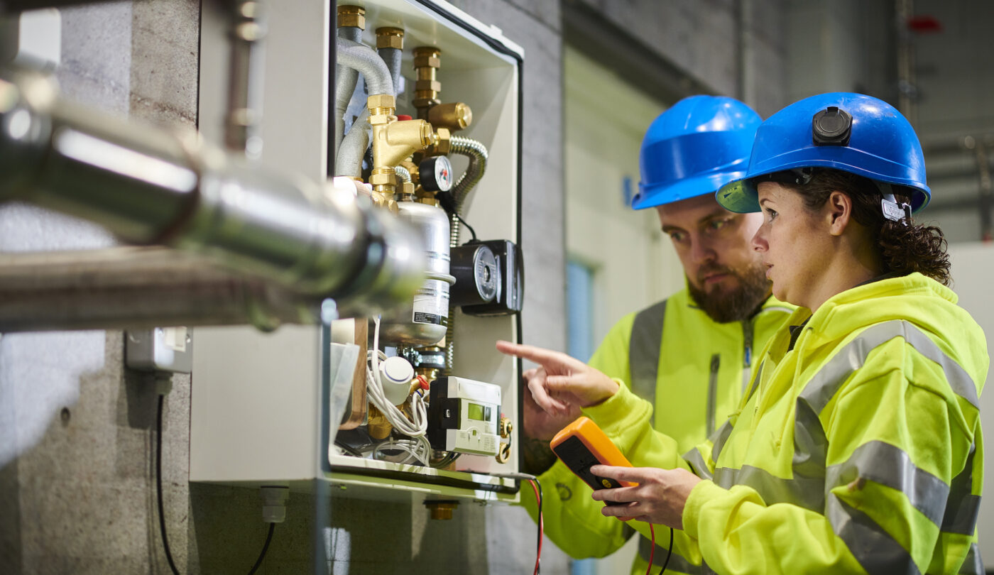 electrical engineers in boiler room